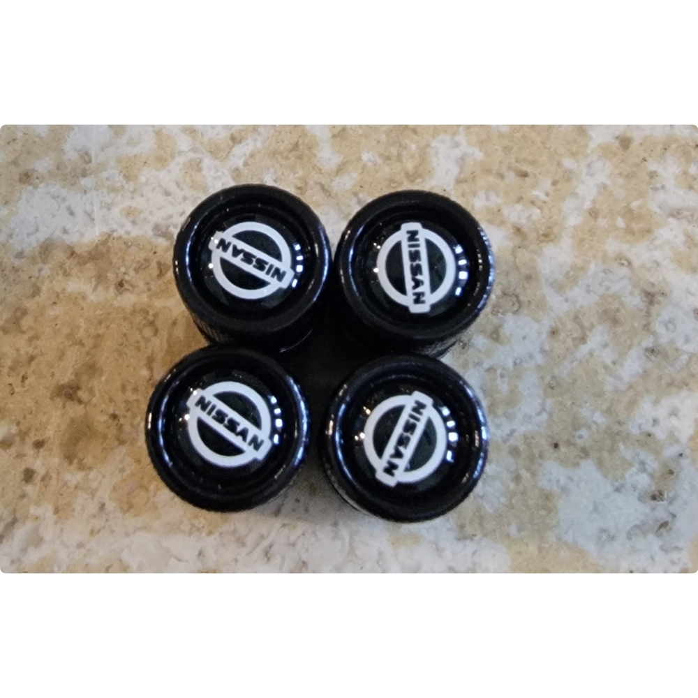 Nissan Black Tire Valve Caps Set